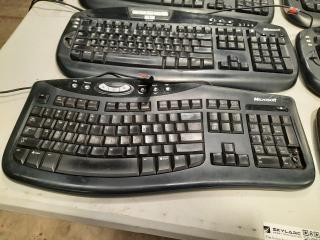 Assortment of Keyboards and Mouse