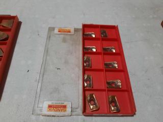 4 Packs of Assorted Sandvik Coromant Milling Inserts.