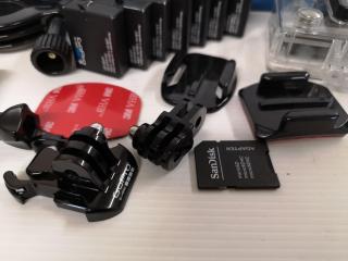 GoPro Hero 4 Action Camera w/ 8x Batteries, Assorted Accessories, Case