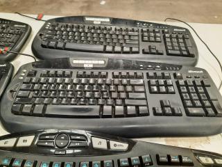 Assortment of Keyboards and Mouse