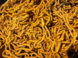 Large Pile of Yellow Plastic Safety Chain