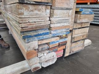 Stack of Assorted Wood Boards, Concrete Formers, & More