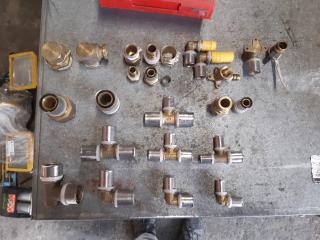 Tray of various SPK rifeng press fit pipe fittings.