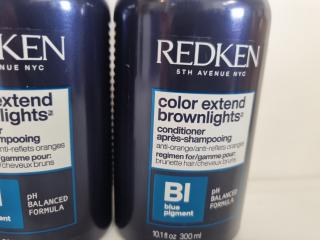 4 Bottles Redken Shampoo and Container