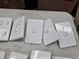 Assorted Electrical Wall Switches and Power Outlets