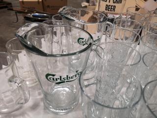122x Assorted Brand Labeled Glass Cup, Mugs, Pitchers, + Coasters