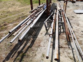 Assorted Lot of Steel Piping with 2x Heavy Duty Racks