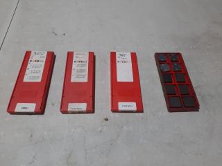4 Packs of Assorted Sandvik Coromant Milling Inserts.