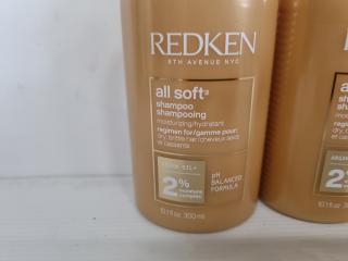 4 Bottles Redken Shampoo and Container