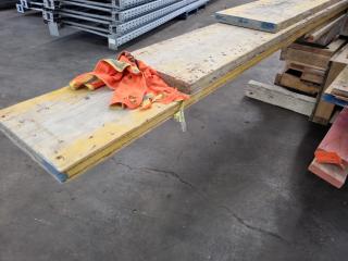 Stack of Assorted Wood Boards, Concrete Formers, & More