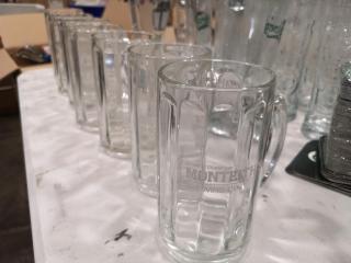 122x Assorted Brand Labeled Glass Cup, Mugs, Pitchers, + Coasters