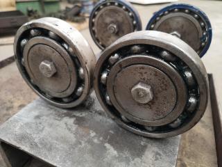 Pair of Floor Level Industrial Piping Rollers
