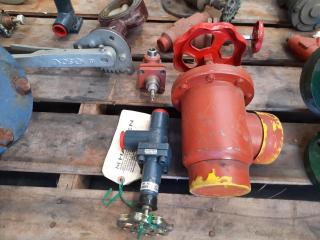 Assortment of Large Pipes and Valves