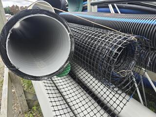 Assorted Drainage Pipes and Mesh