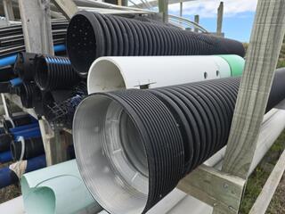 Assorted Drainage Pipes and Mesh