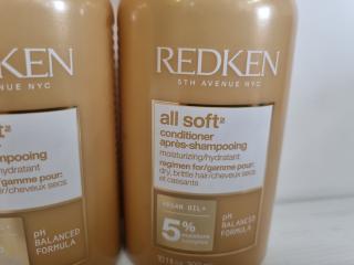 4 Bottles Redken Shampoo and Container