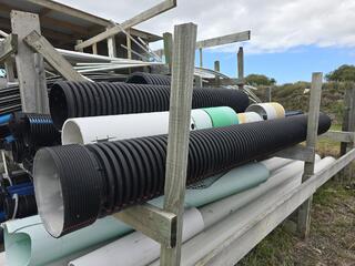 Assorted Drainage Pipes and Mesh