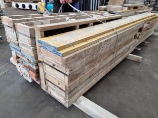 Stack of Assorted Wood Boards, Concrete Formers, & More