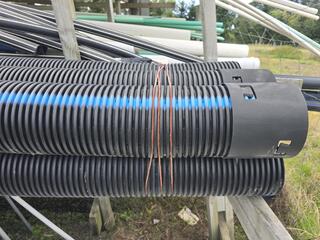 Assorted Drainage Pipes and Mesh